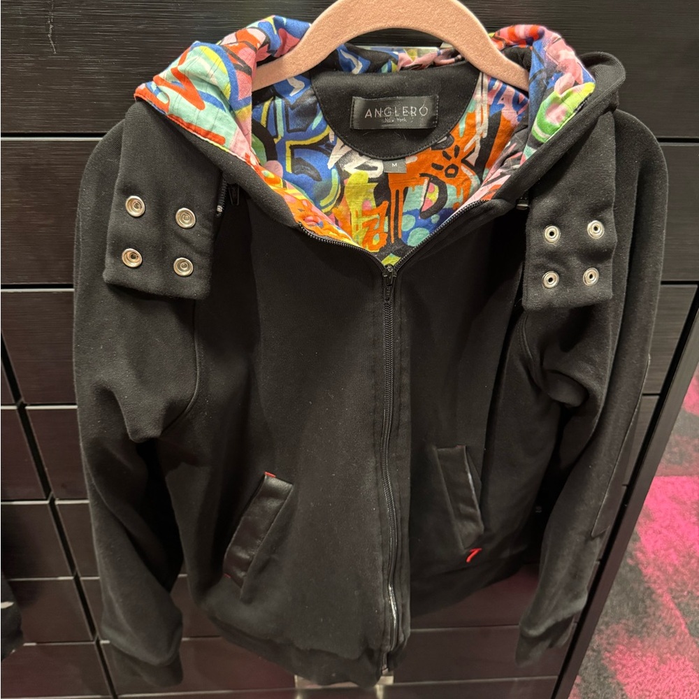 Black hoodie with graffiti lining